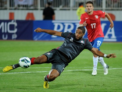 110912 - Serbia v Wales - 2014 World Cup Qualifier -Ashley Williams of Wales plays the ball