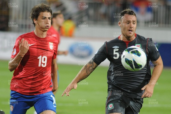 110912 - Serbia v Wales - 2014 World Cup Qualifier -Filip DURICIC of Serbia and Darcy BLAKE of Wales compete