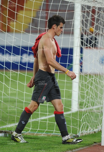 110912 - Serbia v Wales - 2014 World Cup Qualifier -Gareth Bale of Wales looks dejected at the end of the game