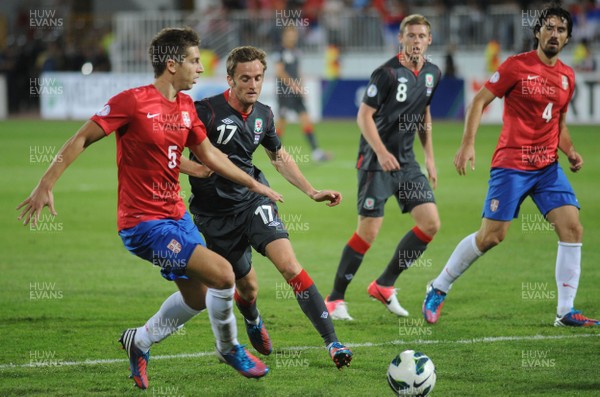 110912 - Serbia v Wales - 2014 World Cup Qualifier -Aleksandar IGNJOVSKI of Wales and Matija NASTASIC of Serbia compete