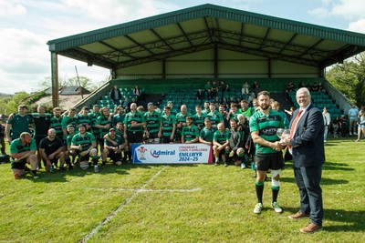 260425 - Seven Sisters v Crynant - Admiral National League 4 West Central - WRU representative Jeff Davies presents the trophy to Seven Sisters captain Kyle Davies