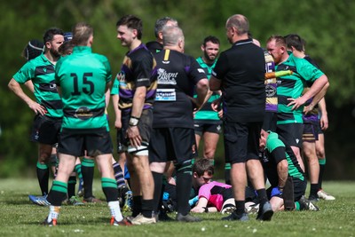 260425 - Seven Sisters v Crynant - Admiral National League 4 West Central - The referee receives treatment after getting injured