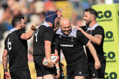100525 - Seven Sisters v Gwernyfed, Mens Division 4 Cup Final - Team mates celebrate with Craig Kendall of Seven Sisters  after he races in to score try