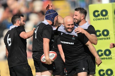 100525 - Seven Sisters v Gwernyfed, Mens Division 4 Cup Final - Team mates celebrate with Craig Kendall of Seven Sisters  after he races in to score try