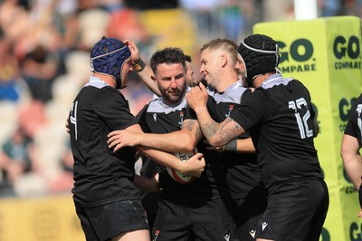 100525 - Seven Sisters v Gwernyfed, Mens Division 4 Cup Final - Team mates celebrate with Craig Kendall of Seven Sisters  after he races in to score try