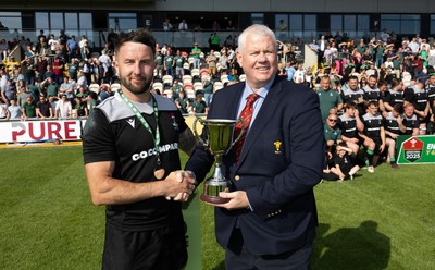 100525 - Seven Sisters v Gwernyfed, Mens Division 4 Cup Final - Seven Sisters captain Kyle Davies receives the Division 4 trophy from WRU representative Jeff Davies