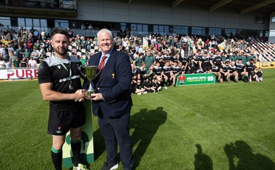 100525 - Seven Sisters v Gwernyfed, Mens Division 4 Cup Final - Seven Sisters captain Kyle Davies receives the Division 4 trophy from WRU representative Jeff Davies