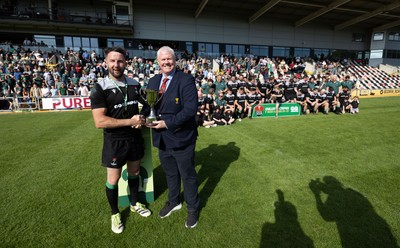100525 - Seven Sisters v Gwernyfed, Mens Division 4 Cup Final - Seven Sisters captain Kyle Davies receives the Division 4 trophy from WRU representative Jeff Davies