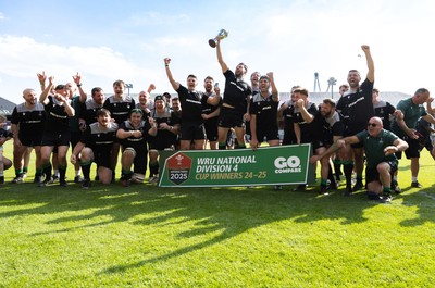100525 - Seven Sisters v Gwernyfed, Mens Division 4 Cup Final - Seven Sisters celebrate as they lift the Division 4 trophy after beating Seven Sisters in the Final