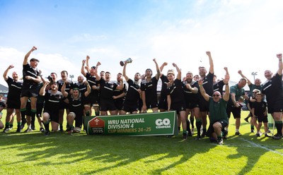 100525 - Seven Sisters v Gwernyfed, Mens Division 4 Cup Final - Seven Sisters celebrate as they lift the Division 4 trophy after beating Seven Sisters in the Final