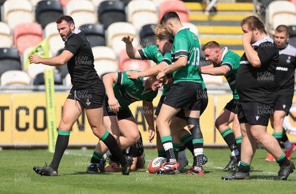100525 - Seven Sisters v Gwernyfed, Mens Division 4 Cup Final - Team mates celebrate with Gethin Davies of Gwernyfed after he scores try