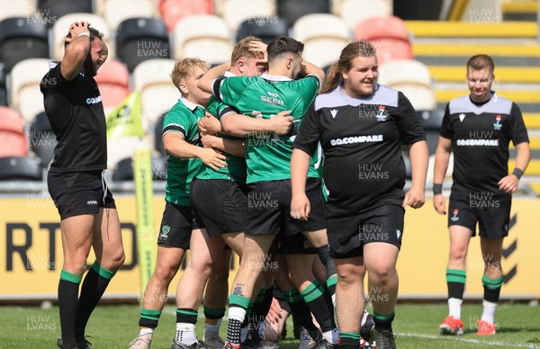 100525 - Seven Sisters v Gwernyfed, Mens Division 4 Cup Final - Team mates celebrate with Gethin Davies of Gwernyfed after he scores try