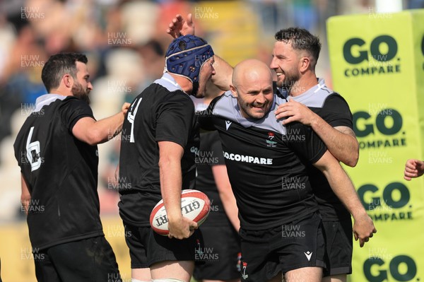 100525 - Seven Sisters v Gwernyfed, Mens Division 4 Cup Final - Team mates celebrate with Craig Kendall of Seven Sisters  after he races in to score try