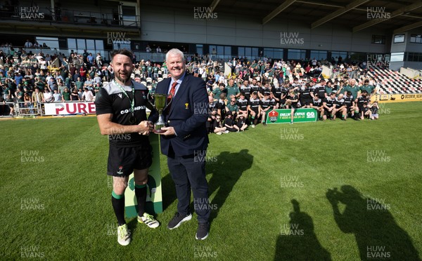 100525 - Seven Sisters v Gwernyfed, Mens Division 4 Cup Final - Seven Sisters captain Kyle Davies receives the Division 4 trophy from WRU representative Jeff Davies