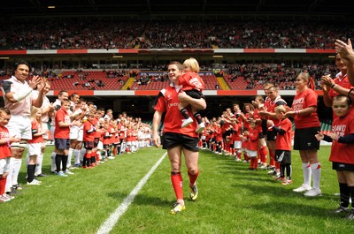 17.05.08 - Shane Williams XV v Justin Marshall XV Shane Williams walks out with his daughter Georgie 