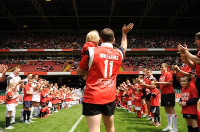 17.05.08 - Shane Williams XV v Justin Marshall XV Shane Williams walks out with his daughter Georgie 