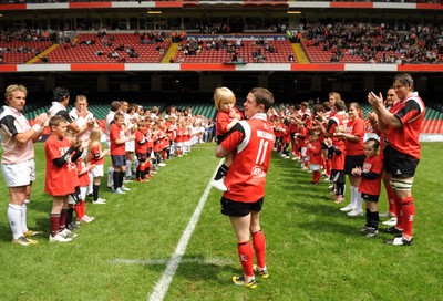 17.05.08 - Shane Williams XV v Justin Marshall XV Shane Williams walks out with his daughter Georgie 