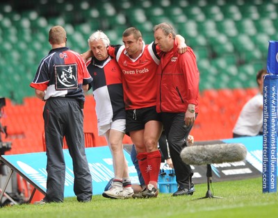 17.05.08 - Shane Williams XV v Justin Marshall XV Huw Bennett goes off with an injury 