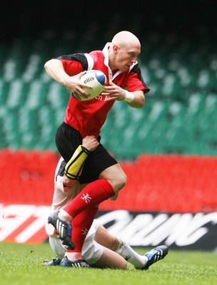 17.05.08 Shane Williams XV v Justin Marshall XV Tom Shanklin is tackled by Ceri Sweeney.  