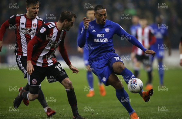 020418 - Sheffield United v Cardiff City, Sky Bet Championship - Kenneth Zohore of Cardiff City plays the ball past Richard Stearman of Sheffield United