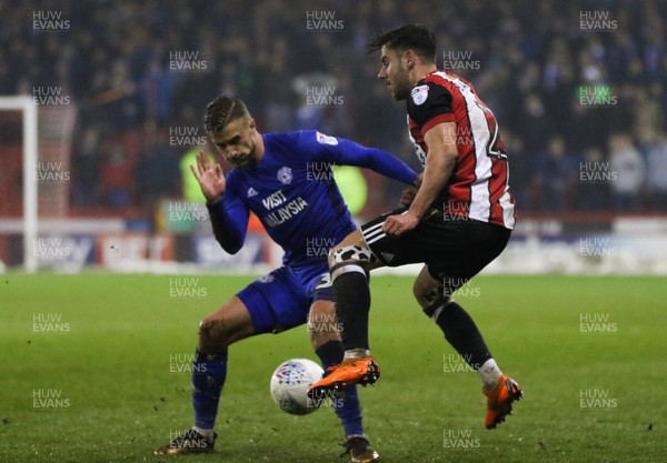 020418 - Sheffield United v Cardiff City, Sky Bet Championship - Joe Bennett of Cardiff City and George Baldock of Sheffield United compete for the ball