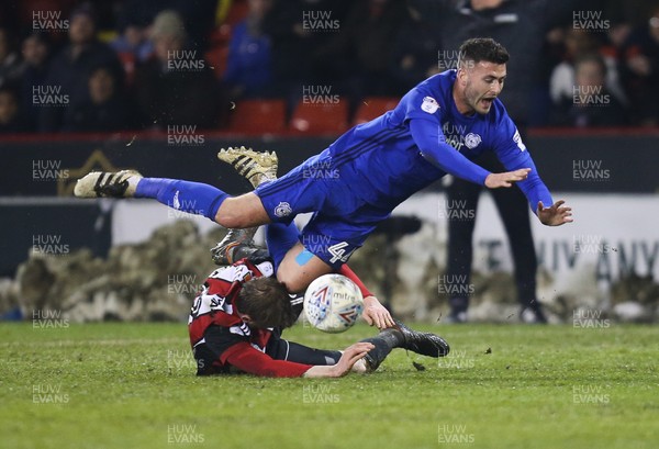 020418 - Sheffield United v Cardiff City, Sky Bet Championship - Gary Madine of Cardiff City is brought down by Richard Stearman of Sheffield United