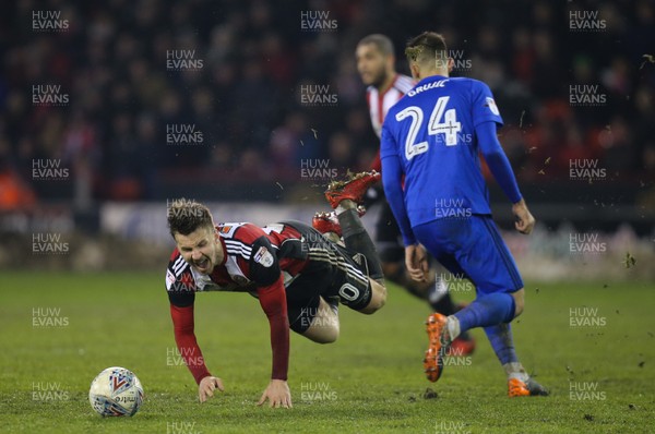 020418 - Sheffield United v Cardiff City, Sky Bet Championship - Lee Evans of Sheffield United is brought down by Marko Grujic of Cardiff City