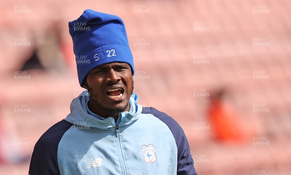 150423 - Sheffield United v Cardiff City - Sky Bet Championship - Sory Kaba of Cardiff warms up in crazy hat