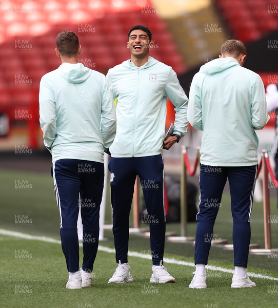 230422 - Sheffield United v Cardiff City - Sky Bet Championship - Laughter as the team inspect the pitch before the warm up