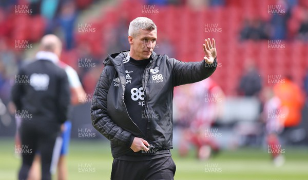 230422 - Sheffield United v Cardiff City - Sky Bet Championship - Manager Steve Morison of Cardiff waves to the fans at the warm up