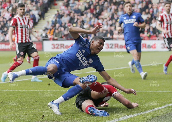 230422 - Sheffield United v Cardiff City - Sky Bet Championship - Cody Drameh of Cardiff is blocked in the box by Jack Robinson of Sheffield Utd