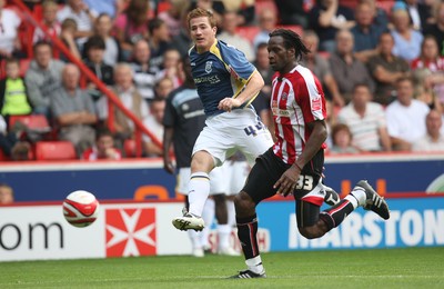 30.08.08...Sheffield United v Cardiff City, Coca Cola Championship -  Cardiff's Ross McCormack fires a shot at goal past United's Ugo Ehiogu 