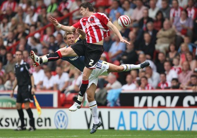 30.08.08...Sheffield United v Cardiff City, Coca Cola Championship -  United's Greg Halford  and Cardiff's Stephen McPhail battle for the ball 