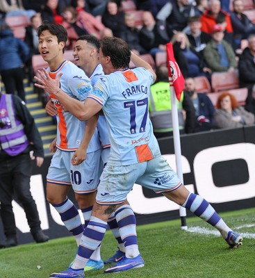 030426 - Sheffield United v Swansea City - Sky Bet Championship - Eom Ji-sung of Swansea celebrates after scoring the equalising goal to make it 3-3 with Goncalo Franco of Swansea and Gustavo Nunes of Swansea