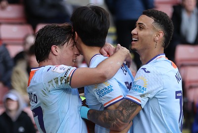 030426 - Sheffield United v Swansea City - Sky Bet Championship - Eom Ji-sung of Swansea celebrates the equaliser with Goncalo Franco of Swansea and Gustavo Nunes of Swansea