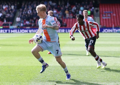 030426 - Sheffield United v Swansea City - Sky Bet Championship - Melker Widell of Swansea followed by Andre Brooks of Sheffield Utd