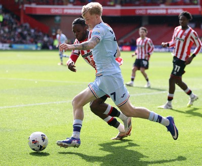 030426 - Sheffield United v Swansea City - Sky Bet Championship - Melker Widell of Swansea and Femi Seriki of Sheffield Utd