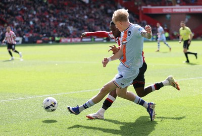 030426 - Sheffield United v Swansea City - Sky Bet Championship - Melker Widell of Swansea and Femi Seriki of Sheffield Utd