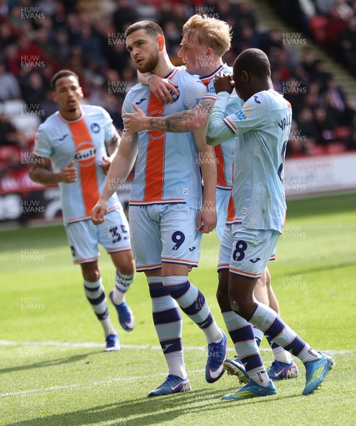 030426 - Sheffield United v Swansea City - Sky Bet Championship - Zan Vipotnik of Swansea celebrates scoring penalty goal to equal scores 1-1 with Melker Widell of Swansea and Malick Yalcouye of Swansea