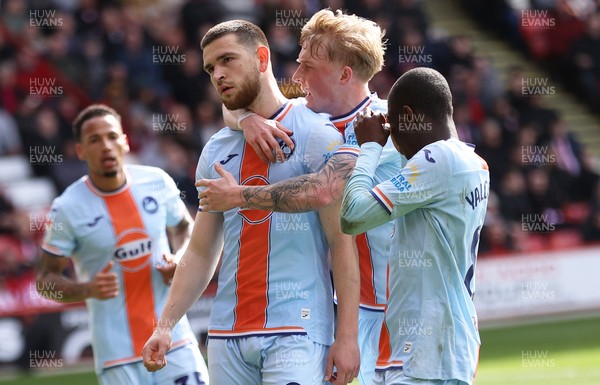 030426 - Sheffield United v Swansea City - Sky Bet Championship - Zan Vipotnik of Swansea celebrates scoring penalty goal to equal scores 1-1 with Melker Widell of Swansea and Malick Yalcouye of Swansea