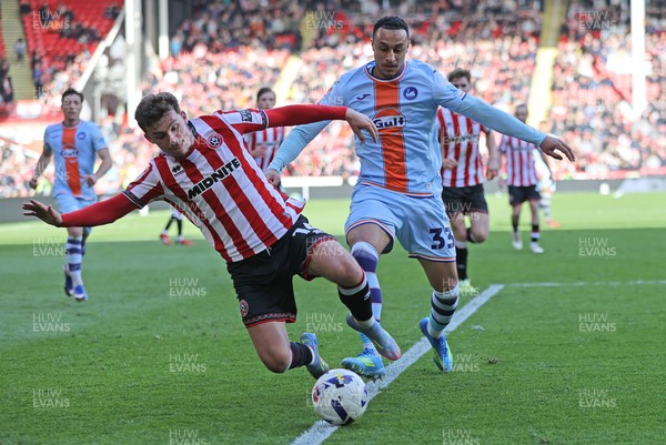 030426 - Sheffield United v Swansea City - Sky Bet Championship - Adam Idah of Swansea and Harrison Burrows of Sheffield United