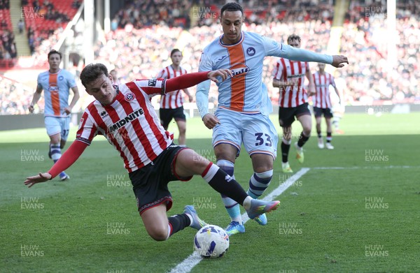 030426 - Sheffield United v Swansea City - Sky Bet Championship - Adam Idah of Swansea and Harrison Burrows of Sheffield United