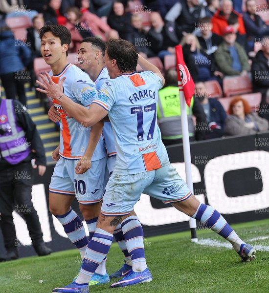 030426 - Sheffield United v Swansea City - Sky Bet Championship - Eom Ji-sung of Swansea celebrates after scoring the equalising goal to make it 3-3 with Goncalo Franco of Swansea and Gustavo Nunes of Swansea