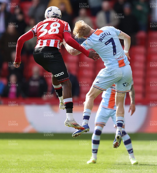 030426 - Sheffield United v Swansea City - Sky Bet Championship - Melker Widell of Swansea and Femi Seriki of Sheffield United