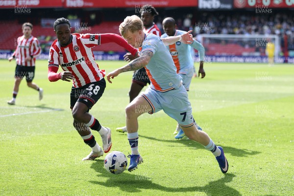 030426 - Sheffield United v Swansea City - Sky Bet Championship - Melker Widell of Swansea and Femi Seriki of Sheffield Utd