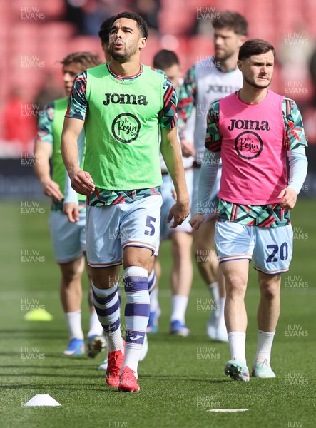 030426 - Sheffield United v Swansea City - Sky Bet Championship - Ben Cabango of Swansea, Marko Stamenic of Swansea and Liam Cullen of Swansea during the warm up