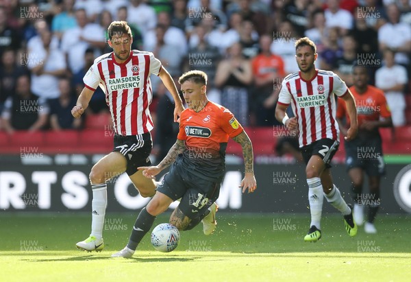 040818 - Sheffield United v Swansea City, Sky Bet Championship - Barrie McKay of Swansea City gets away from Chris Basham of Sheffield United