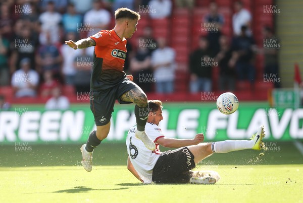 040818 - Sheffield United v Swansea City, Sky Bet Championship - Barrie McKay of Swansea City is tackled by Chris Basham of Sheffield United