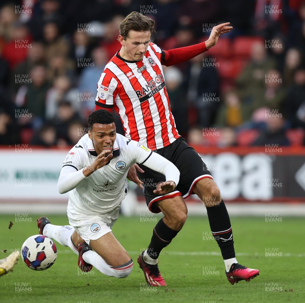 110223 - Sheffield United v Swansea City - Sky Bet Championship - Morgan Whittaker of Swansea and Sander Berge of Sheffield Utd in goalmouth but no penalty given