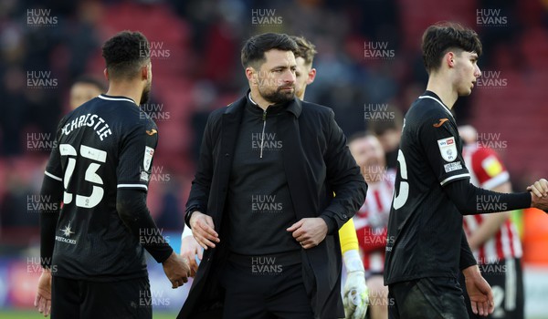 190222 - Sheffield United v Swansea City - Sky Bet Championship - Head Coach Russell Martin  of Swansea joins his players on the pitch after losing 4-0 to Sheff Utd